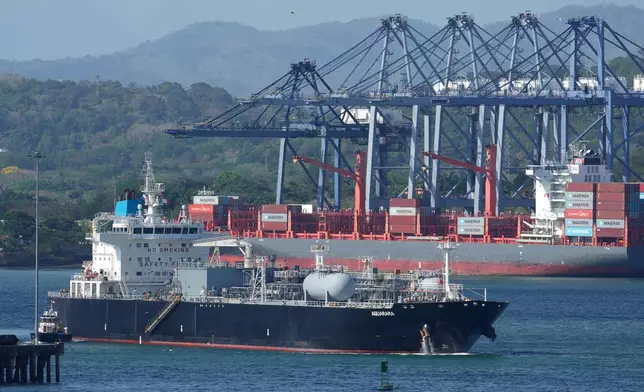 An LPG tanker transits the Panama Canal in Panama City, Thursday, March 12, 2026. (AP Photo/Matias Delacroix)