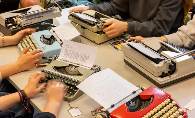 Students use typewriters to complete a writing assignment in German at Cornell University, Friday, March 20, 2026, in Ithaca, N.Y. Their professor, Grit Matthias Phelps, brings out the typewriters once each semester for students to disconnect from technology and connect with the assignment in a different way. (AP Photo/Lauren Petracca)