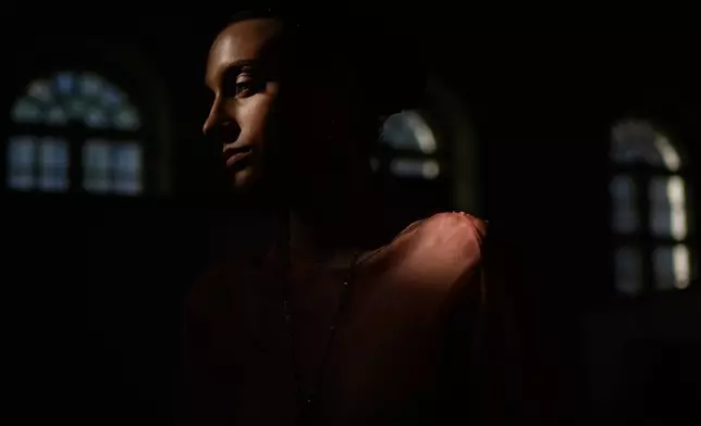 A model is prepared for a runway show at the backstage of the Moscow Fashion Week in Moscow, Saturday, March 14, 2026. (AP Photo/Pavel Bednyakov)
