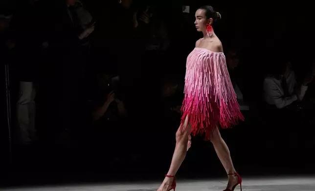 A model wears a creation by Russian brand Big Brooch on a runway at the Moscow Fashion Week in Moscow, Saturday, March 14, 2026. (AP Photo/Pavel Bednyakov)