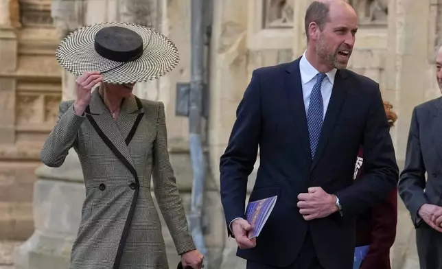 Britain's Kate, Princess of Wales, and Prince William leave after the installation of Sarah Mullally as archbishop of Canterbury in Canterbury, England, Wednesday, March 25, 2026, the first woman ever to lead the Church of England. (AP Photo/Alastair Grant)