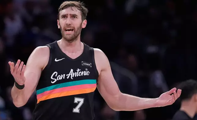 San Antonio Spurs' Luke Kornet reacts to a call during the first half of an NBA basketball game against the New York Knicks Sunday, March 1, 2026, in New York. (AP Photo/Seth Wenig)