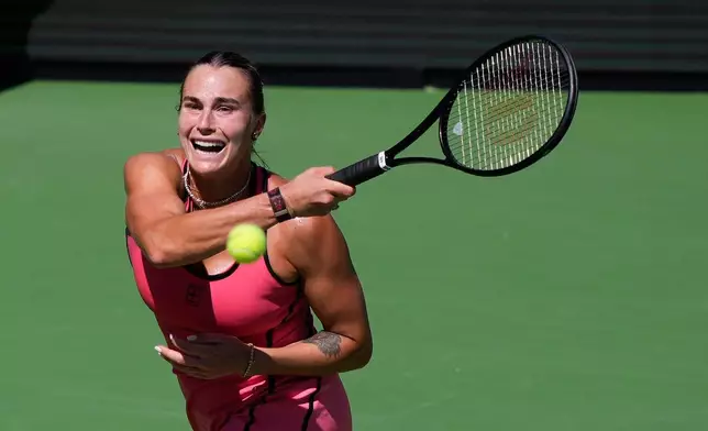 Aryna Sabalenka, of Belarus, returns to Elena Rybakina, of Kazakhstan, during a final match at the BNP Paribas Open tennis tournament Sunday, March 15, 2026, in Indian Wells, Calif. (AP Photo/Mark J. Terrill)