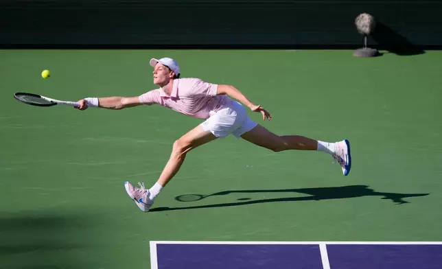 Jannik Sinner, of Italy, returns a shot against Daniil Medvedev, of Russia, during a final match at the BNP Paribas Open tennis tournament, Sunday, March 15, 2026, in Indian Wells, Calif. (AP Photo/Mark J. Terrill)