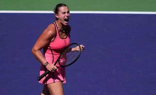 Aryna Sabalenka, of Belarus, reacts after winning a point against Elena Rybakina, of Kazakhstan, during a final match at the BNP Paribas Open tennis tournament Sunday, March 15, 2026, in Indian Wells, Calif. (AP Photo/Mark J. Terrill)