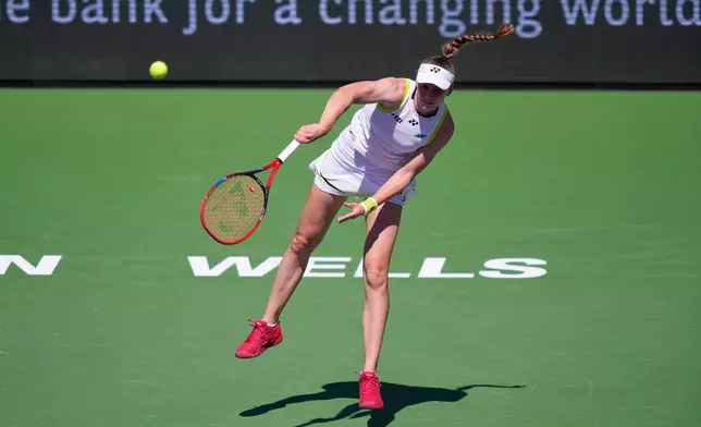 Elena Rybakina, of Kazakhstan, serves to Aryna Sabalenka, of Belarus, during a final match at the BNP Paribas Open tennis tournament Sunday, March 15, 2026, in Indian Wells, Calif. (AP Photo/Mark J. Terrill)