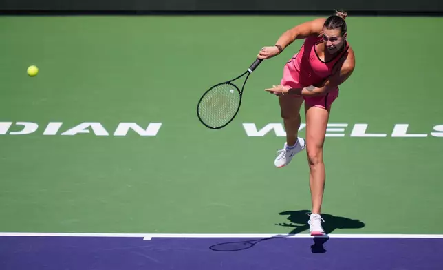 Aryna Sabalenka, of Belarus, serves to Elena Rybakina, of Kazakhstan, during a final match at the BNP Paribas Open tennis tournament Sunday, March 15, 2026, in Indian Wells, Calif. (AP Photo/Mark J. Terrill)