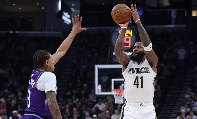 New Orleans Pelicans guard Saddiq Bey (41) goes up for a 3-point shot over Utah Jazz guard Keyonte George (3) during the first half of an NBA basketball game, Saturday, Feb. 28, 2026, in Salt Lake City. (AP Photo/Rob Gray)