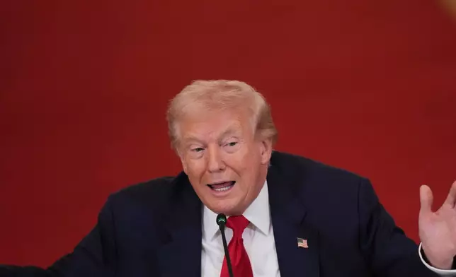 President Donald Trump speaks during a roundtable discussion on college sports in the East Room of the White House, Friday, March 6, 2026, in Washington. (AP Photo/Julia Demaree Nikhinson)