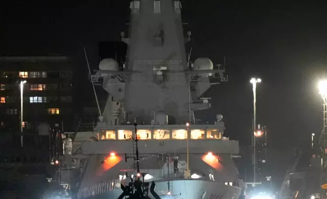 Royal Navy Type 45 destroyer HMS Dragon at the HM Naval Base in Portsmouth Harbour, in Hampshire, England, Tuesday, March 3, 2026, ahead of being deployed to protect British military personnel in Cyprus. (Andrew Matthews/PA via AP)