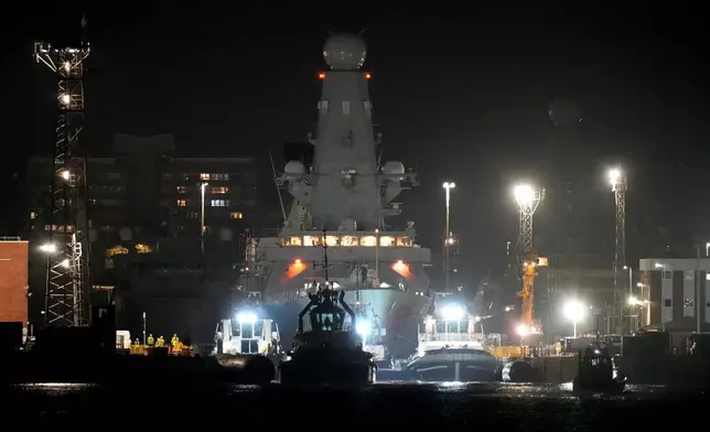 Royal Navy Type 45 destroyer HMS Dragon at the HM Naval Base, in Portsmouth Harbour, in Hampshire, England, Tuesday March 3, 2026, ahead of being deployed to protect British military personnel in Cyprus. (Andrew Matthews/PA via AP)
