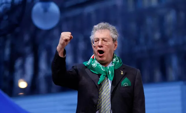 FILE - Northern League party leader Umberto Bossi gestures during a rally in Milan, Italy, March 25, 2010. Bossi died at the age of 84 on Thursday, March 19, 2026. (AP Photo/Luca Bruno, File)