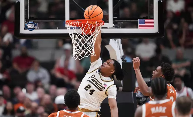 Purdue guard Gicarri Harris (24) dunks during the first half in the Sweet 16 of the NCAA college basketball tournament against Texas, Thursday, March 26, 2026, in San Jose, Calif. (AP Photo/Godofredo A. Vásquez)