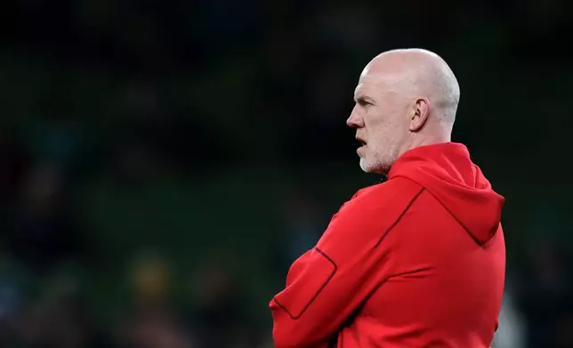 Wales' head coach Steve Tandy watches on players warm up for the Six Nations rugby union match between Ireland and Wales in Dublin, Ireland, Friday, March 6, 2026. (AP Photo/Peter Morrison)