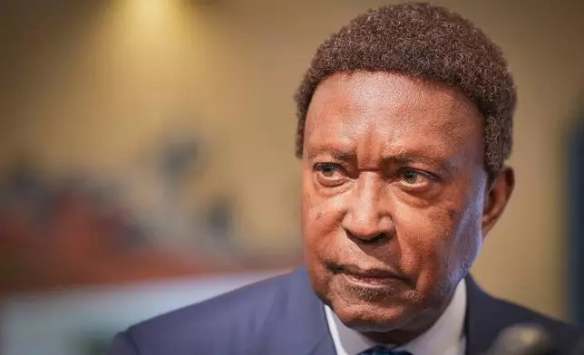 Attorney John Burris speaks during a news conference in Minneapolis, Thursday, March 26, 2026. (Leila Navidi/Minnesota Star Tribune via AP)