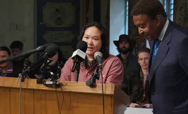 Georgia Savageford recalls watching federal immigration officers fatally shoot Alex Pretti during a news conference Thursday, March 26, 2026, in Minneapolis. (AP Photo/Mark Vancleave)