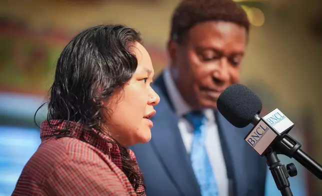 Georgia Savageford speaks during a news conference in Minneapolis, Thursday, March 26, 2026, about being detained by federal agents. (Leila Navidi/Minnesota Star Tribune via AP)