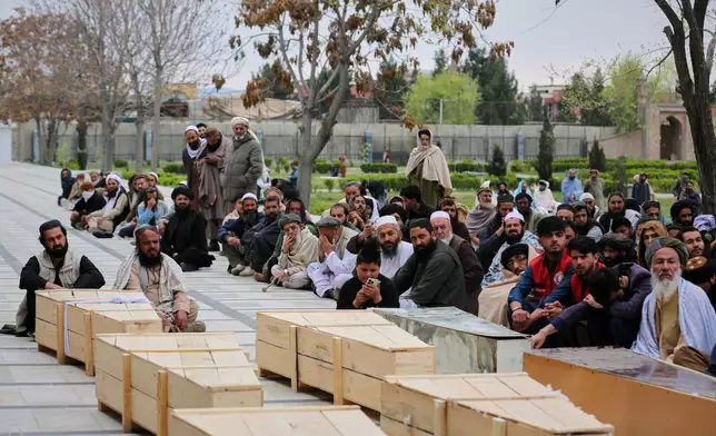 Mourners attend a second mass funeral for victims of an airstrike on a drug rehabilitation center earlier this month, in Kabul, Afghanistan, Thursday, March 26, 2026. (AP Photo/Siddiqullah Alizai)