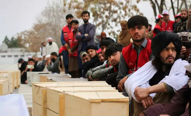Mourners attend a second mass funeral for victims of an airstrike on a drug rehabilitation center earlier this month, in Kabul, Afghanistan, Thursday, March 26, 2026. (AP Photo/Siddiqullah Alizai)