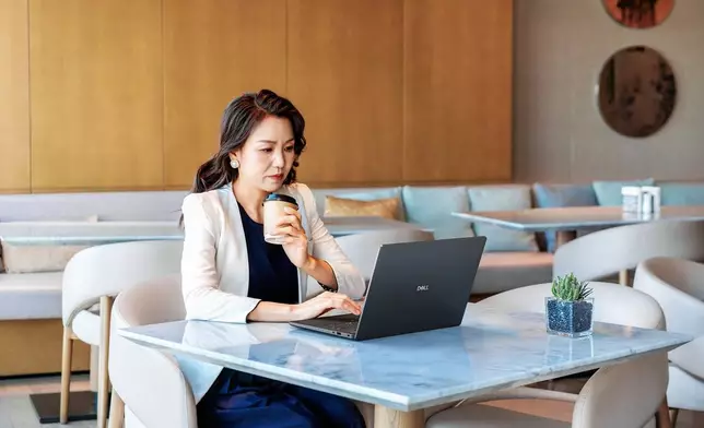 Woman working on a Dell Pro 14 Premium