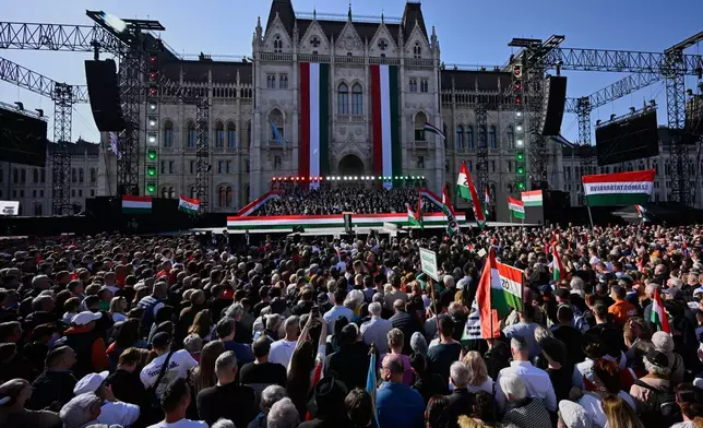 Hungary's Prime Minister Viktor Orban addresses his supporters during a march in Budapest, Hungary, Sunday, March 15, 2026. (AP Photo/Denes Erdos)