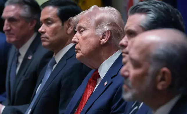 From left, Interior Secretary Doug Burgum, Secretary of State Marco Rubio, President Donald Trump, Defense Secretary Pete Hegseth, and Commerce Secretary Howard Lutnick listen during a Cabinet meeting at the White House, Thursday, March 26, 2026, in Washington. (AP Photo/Alex Brandon)