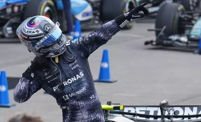 Mercedes driver Kimi Antonelli of Italy reacts after winning the Japanese Formula One Grand Prix at Suzuka in central Japan, Sunday, March 29, 2026. (AP Photo/Hiro Komae)