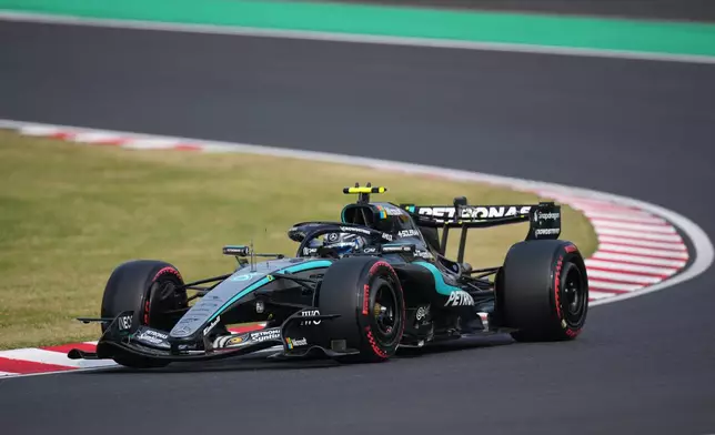 Mercedes driver Kimi Antonelli of Italy steers his car during the qualifying session of the Japanese Formula One Grand Prix in Suzuka, Japan, Saturday, March 28, 2026. (AP Photo/Hiro Komae)