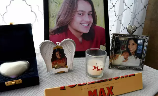 A tribute to Max Osterman, whose mother says he died after taking fentanyl he bought from a dealer on Snapchat, is displayed in his mother's living room in Thornton, Colo., Thursday, March 26, 2026. (AP Photo/Thomas Peipert)