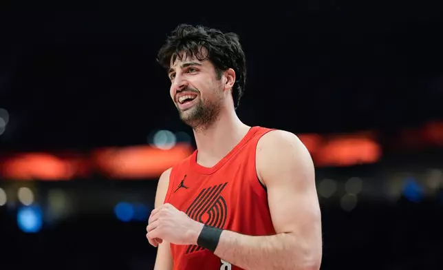 Portland Trail Blazers forward Deni Avdija reacts during the first half of an NBA basketball game against the Washington Wizards, Sunday, March 29, 2026, in Portland, Ore. (AP Photo/Jenny Kane)