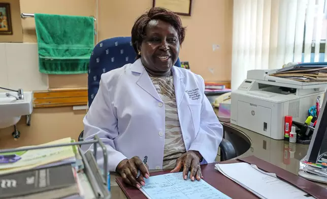 Eunice Cheserem, specialist obstetrician-gynecologist, sits in her office during an interview with The Associated Press in Nairobi, Kenya, Feb. 16, 2026. (AP Photo/Atieno Muyuyi)