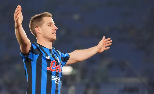 Atalanta's Mario Pasalic celebrates after scoring during the Frecciarossa Italian Cup soccer match between Lazio and Atalanta in, Rome, Italy, Wednesday March 4, 2026. (Alfredo Falcone/LaPresse via AP)