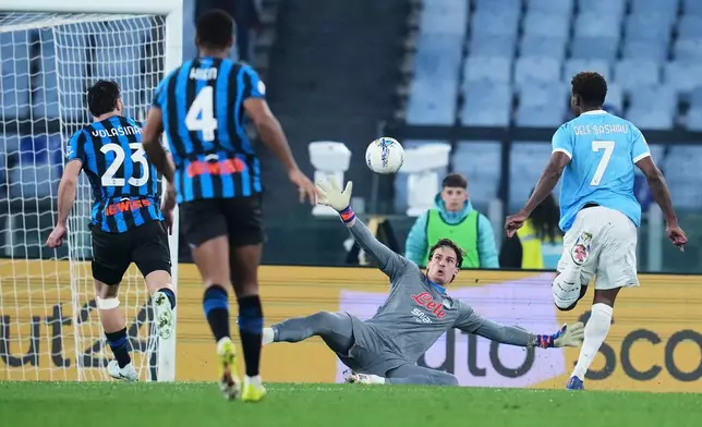 Lazio's Fisayo Dele-Bashiru, right, scores during the Frecciarossa Italian Cup soccer match between Lazio and Atalanta in, Rome, Italy, Wednesday March 4, 2026. (Alfredo Falcone/LaPresse via AP)