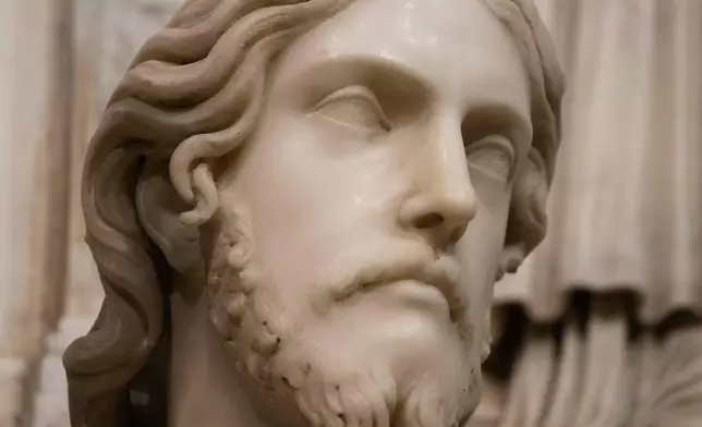 The sculpted bust inside the Basilica of Saint Agnes Outside the Walls, in Rome, Wednesday, March 4, 2026, which, in light of new studies by Italian researcher Valentina Salerno, may be reattributed to Michelangelo Buonarroti. (AP Photo/Gregorio Borgia)