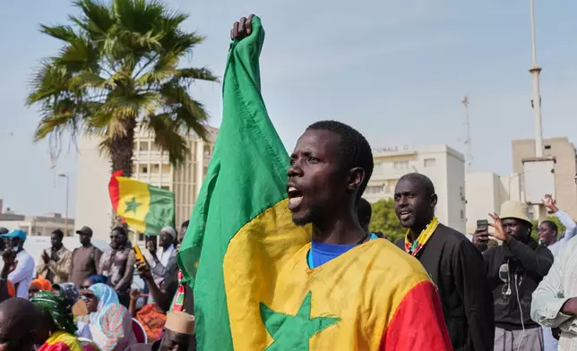 A protestor chants anti-gay slogans during a demonstration against homosexuality in Dakar, Senegal, Friday, March 6, 2026. (AP Photo/Misper Apawu)