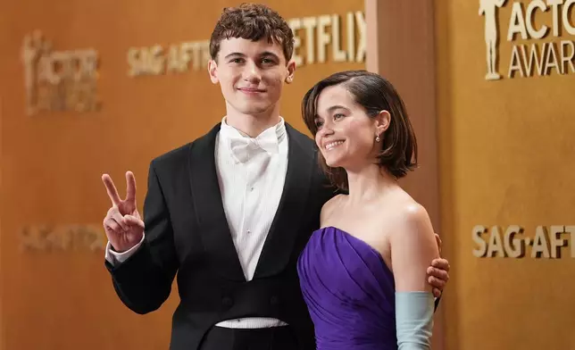 Sam Nivola, left, and Sarah Catherine Hook arrive at the 32nd Annual Actor Awards on Sunday, March 1, 2026, at the Shrine Auditorium and Expo Hall in Los Angeles. (Photo by Richard Shotwell/Invision/AP)
