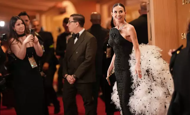 Demi Moore arrives at the 32nd Annual Actor Awards on Sunday, March 1, 2026, at the Shrine Auditorium and Expo Hall in Los Angeles. (Photo by Richard Shotwell/Invision/AP)