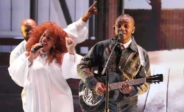 Miles Caton, center, performs 'This Little Light of Mine' during the 32nd Annual Actor Awards on Sunday, March 1, 2026, at the Shrine Auditorium and Expo Hall in Los Angeles. (AP Photo/Chris Pizzello)