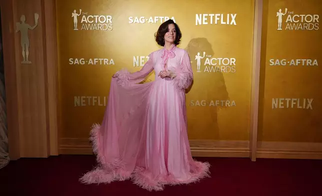 Parker Posey arrives at the 32nd Annual Actor Awards on Sunday, March 1, 2026, at the Shrine Auditorium and Expo Hall in Los Angeles. (Photo by Jordan Strauss/Invision/AP)