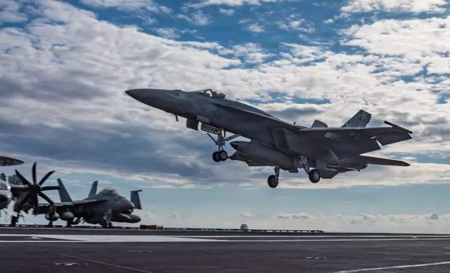 This image provided by U.S. Central Command shows a F/A-18E Super Hornet landing on the USS Gerald R. Ford (CVN 78) in support of Operation Epic Fury, on Sunday, March 1, 2026. (U.S. Navy via AP)