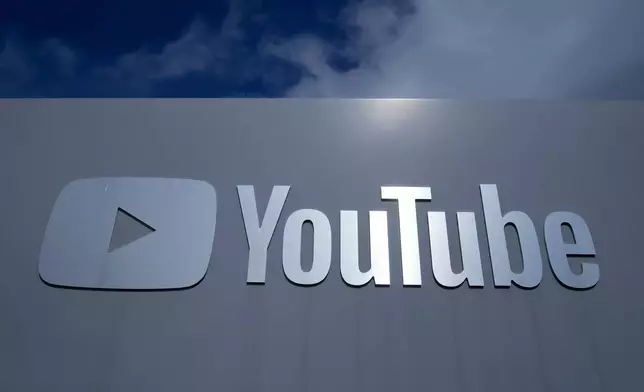 FILE - A YouTube sign is shown near the company's headquarters in San Bruno, Calif., Wednesday, March 12, 2025. (AP Photo/Jeff Chiu, file)