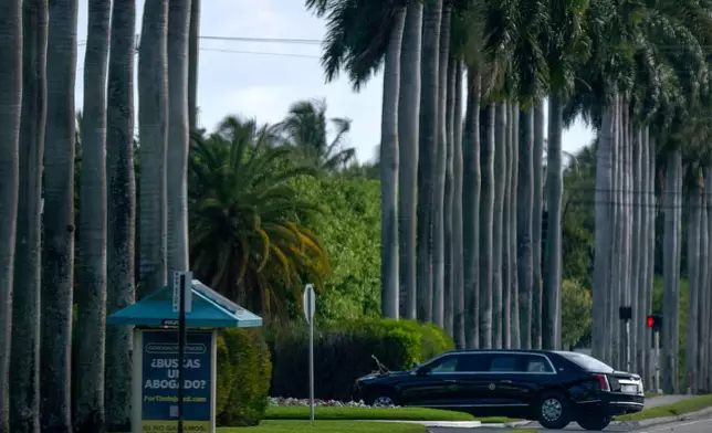 President Donald Trump's limousine arrives at the Trump International Golf Club West Palm Beach in West Palm Beach, Fla., Sunday, March 15, 2026. (AP Photo/Mark Schiefelbein)