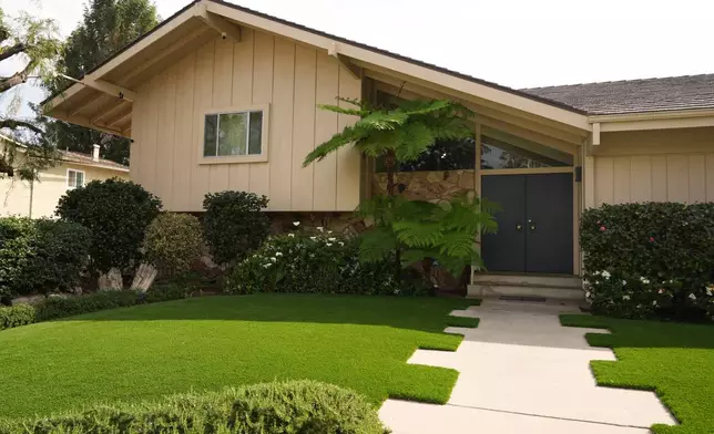 The Brady Bunch House, the two-story single-family home that served as the main setting for the television series "The Brady Bunch" in the Studio City neighborhood of Los Angeles, Wednesday, March 4, 2026, is now designated as a Los Angeles Historic-Cultural Monument. (AP Photo/Damian Dovarganes)