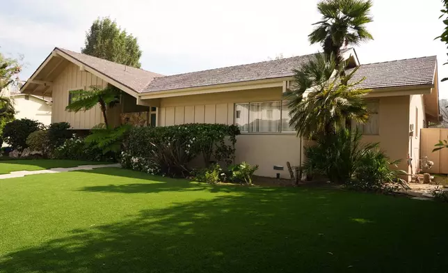 The Brady Bunch House, the two-story single-family home that served as the main setting for the television series "The Brady Bunch" in the Studio City neighborhood of Los Angeles, Wednesday, March 4, 2026, is now designated as a Los Angeles Historic-Cultural Monument. (AP Photo/Damian Dovarganes)