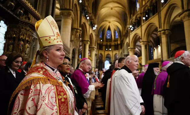 Members of the clergy ahead of the Enthronement Ceremony installing Dame Sarah Mullally as the 106th Archbishop of Canterbury, at Canterbury Cathedral, England, Wednesday March 25, 2026. (Jordan Pettit, Pool Photo via AP)