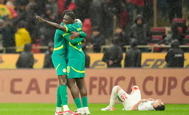 FILE - Sebegalese players celebrate after winning the Africa Cup of Nations final soccer match between Senegal and Morocco, in Rabat, Morocco, Sunday, Jan. 18, 2026. (AP Photo/Mosa'ab Elshamy, File)