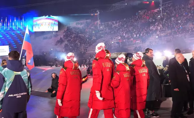 Athletes from Russia walk during the opening ceremony at the 2026 Winter Paralympics, in Verona, Italy, Friday, March 6, 2026. (AP Photo/Antonio Calanni)
