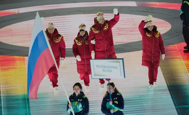 Athletes from Russia enter during the opening ceremony at the 2026 Winter Paralympics, in Verona, Italy, Friday, March 6, 2026. (AP Photo/Luca Bruno)