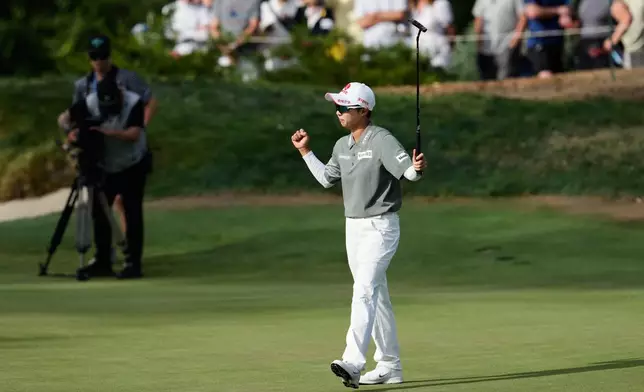 Hyo Joo Kim, of South Korea, reacts after making a birdie putt on the 14th green during the final round of the LPGA Fortinet Founders Cup golf tournament, Sunday, March 22, 2026, in Menlo Park, Calif. (AP Photo/Godofredo A. Vásquez)
