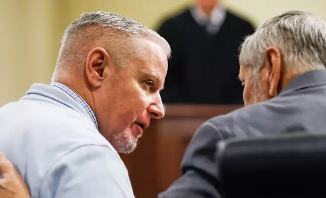 Colin Gray listens to his attorney during closing arguments in his trial at Barrow County Courthouse in Winder, Ga., on Monday, March 2, 2026. (Abbey Cutrer/Atlanta Journal-Constitution via AP)